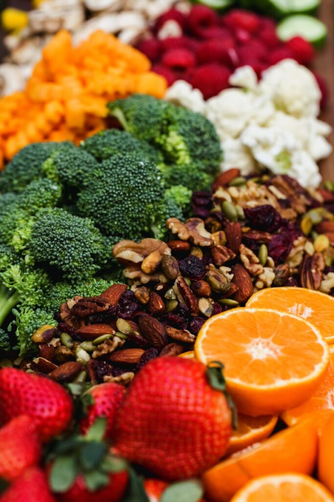 sliced orange fruit and green broccoli